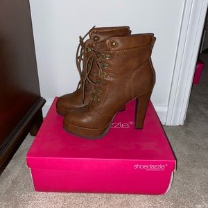Brand new leather heeled boots.